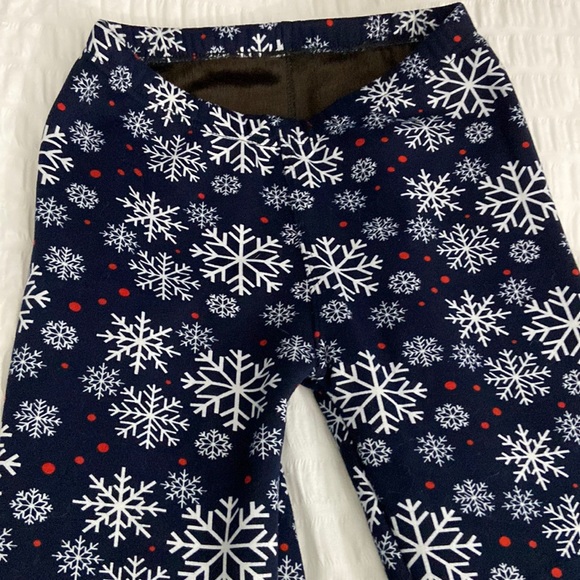 Cozy fleece lined winter leggings.  Snowflake motif.  Super cozy and warm. - Picture 1 of 3